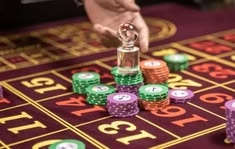 FiveBet casino presented on mobile device in Pakistan with slots and live games